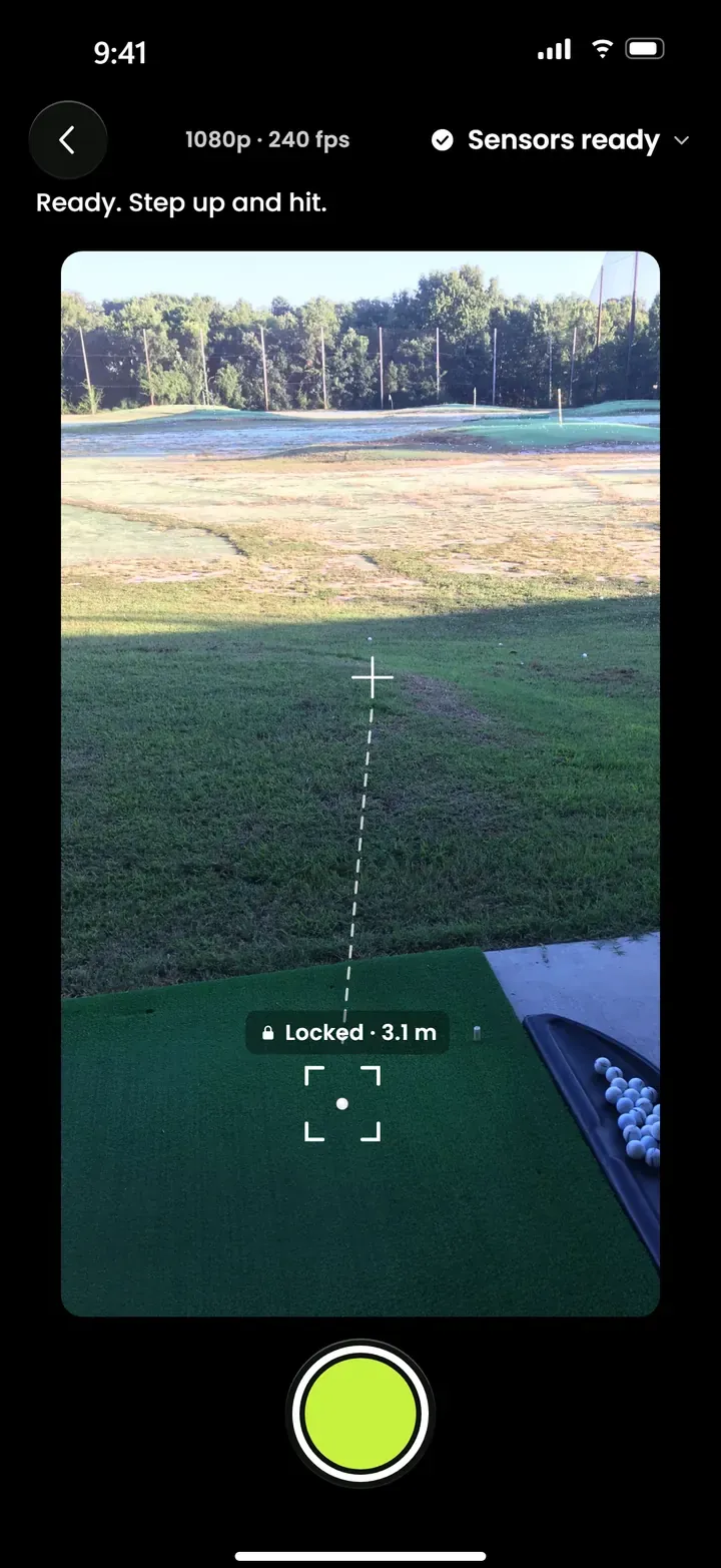 Contrail’s record screen: the ball on the mat, a dashed target line down the range and the lime record button.